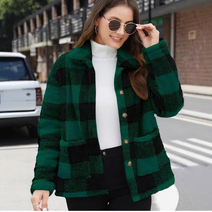 Harlow green plaid button front shacket, front view styled with black pants