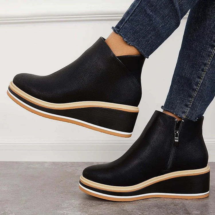 Harlow black wedge ankle boots side view raised heel