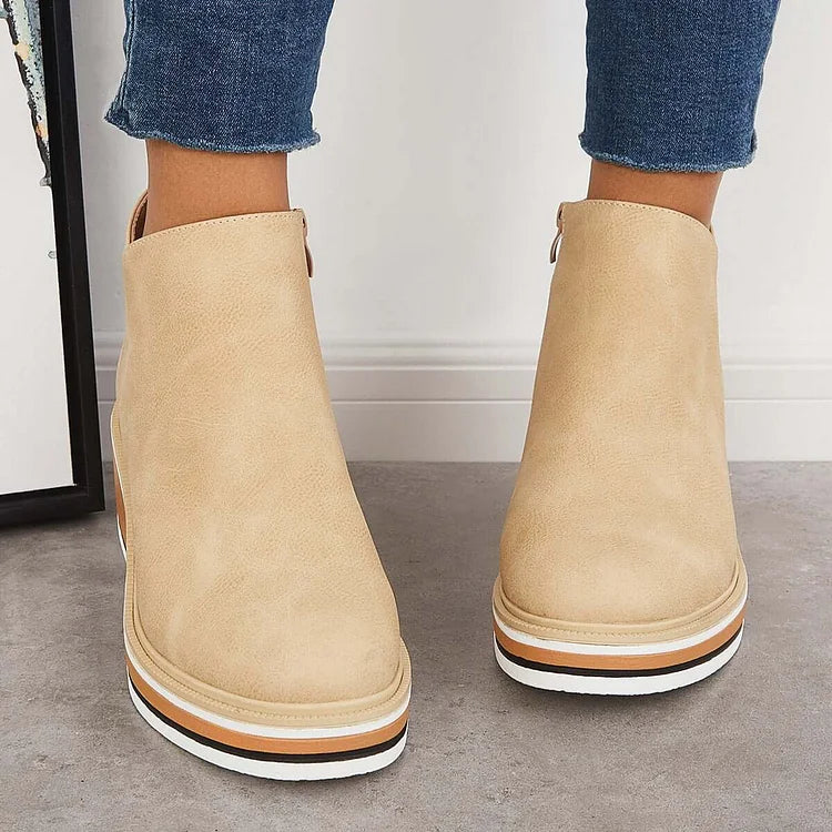 Harlow beige ankle boots back view on model