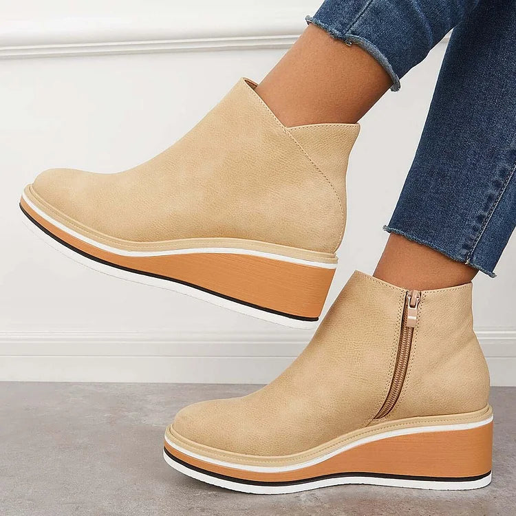 Harlow beige wedge boots side view with zipper detail