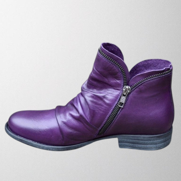 Harlow slouch zipper ankle boot in purple, side view