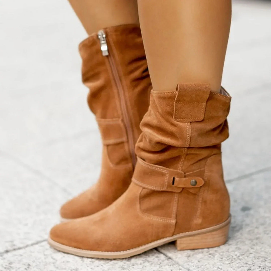 Harlow slouchy suede mid-calf boots in black, side view on model