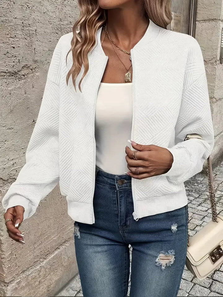 Harlow textured zip-up bomber jacket in white, front view open with white tank top