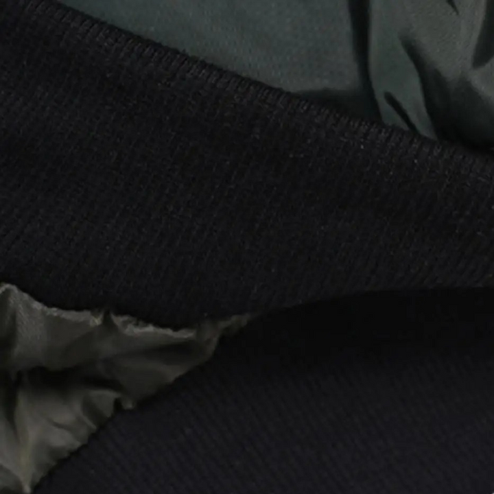 Close-up of ribbed cuff and jacket fabric texture