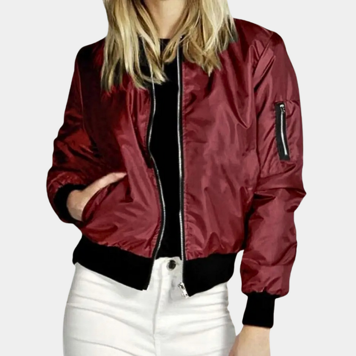 Model wearing Harlow bomber jacket in red
