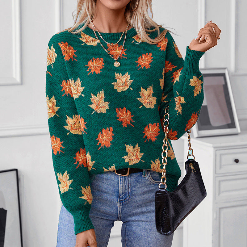 Hazel leaf print crew neck fall sweater, front view with layered necklace