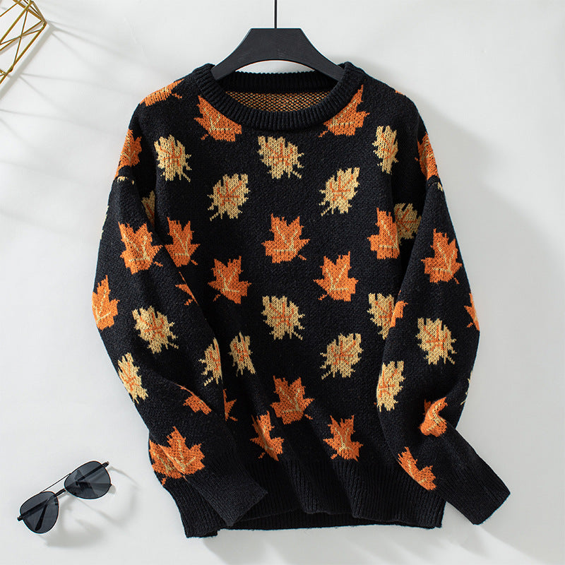 Hazel leaf print crew neck fall sweater, black colorway on hanger