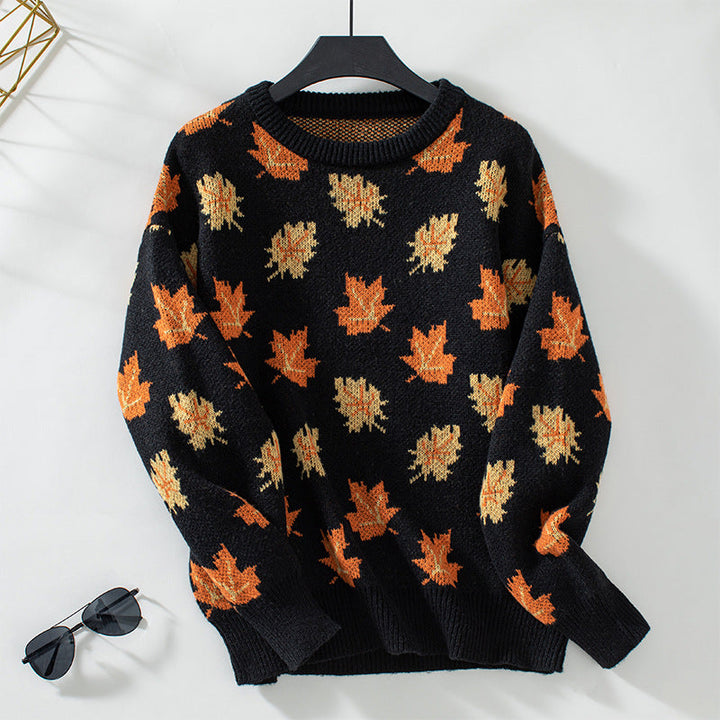 Hazel leaf print crew neck fall sweater, black colorway on hanger