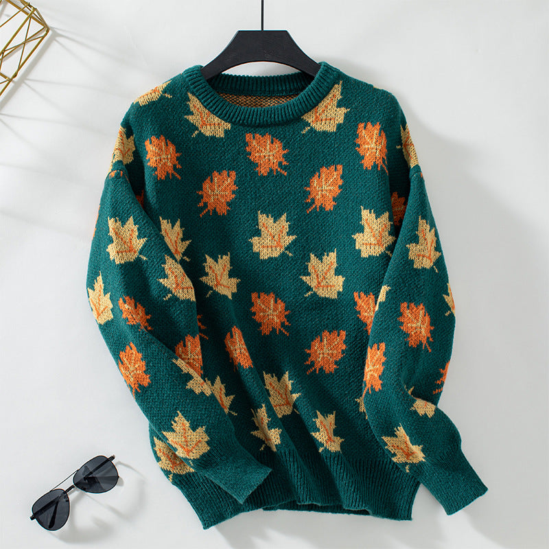 Hazel leaf print crew neck fall sweater, green colorway on hanger