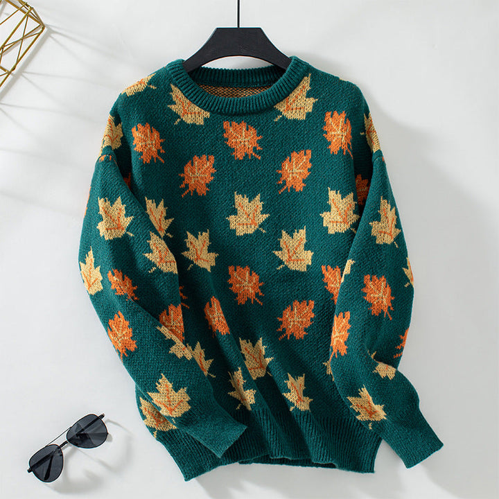 Hazel leaf print crew neck fall sweater, green colorway on hanger