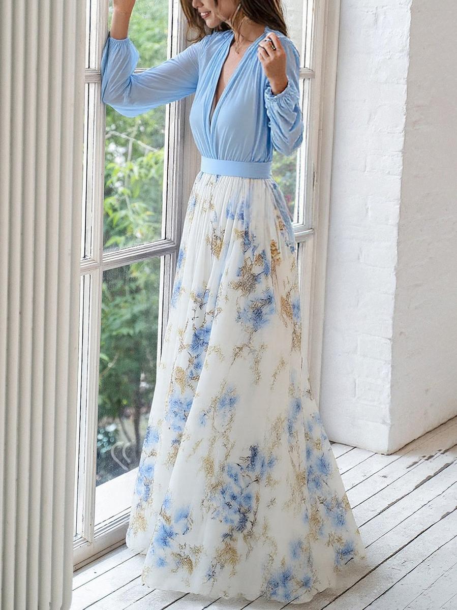 Isabella floral print maxi dress with V-neck and belted waist, side view by window
