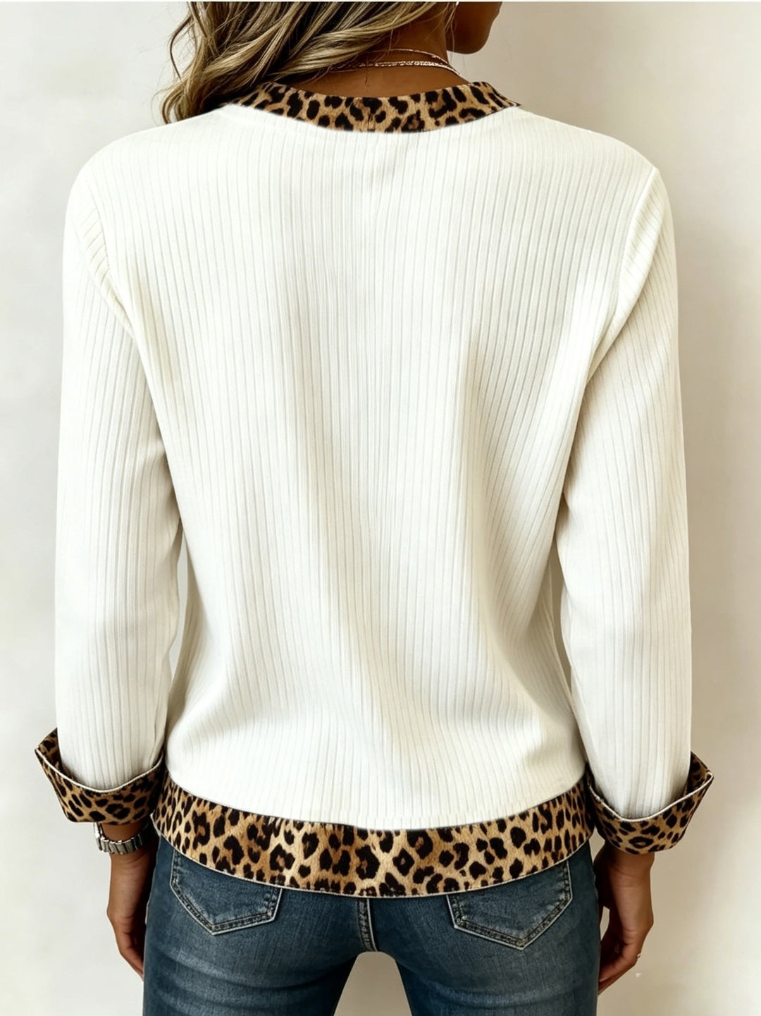 Isolde V-neck top with animal print hem, back view