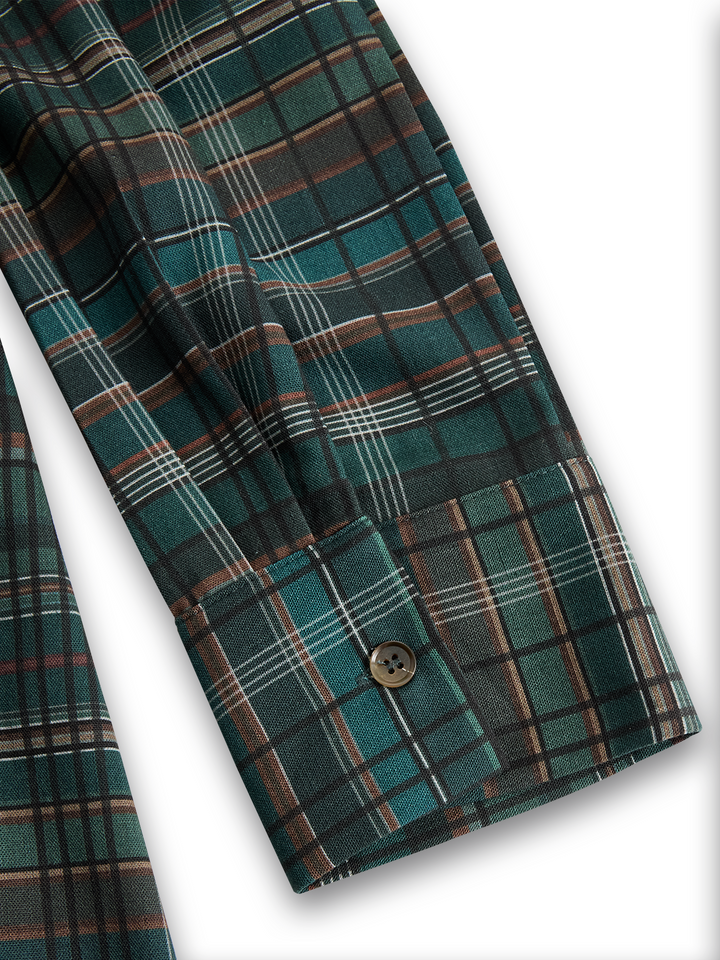 Close-up of Josephine plaid fabric hem seam detail