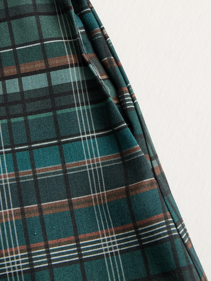 Close-up of Josephine plaid dress collar and button front