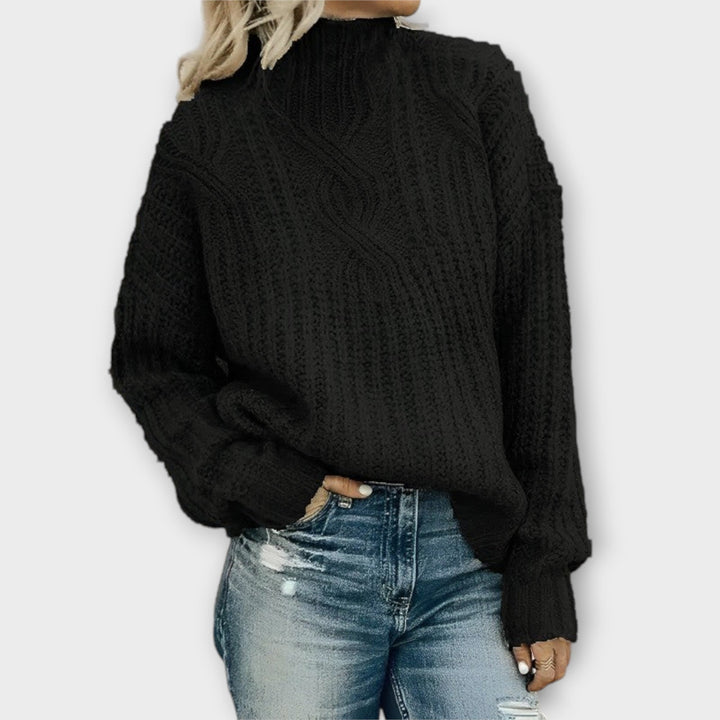 Juniper black cable knit mock neck oversized sweater, front view