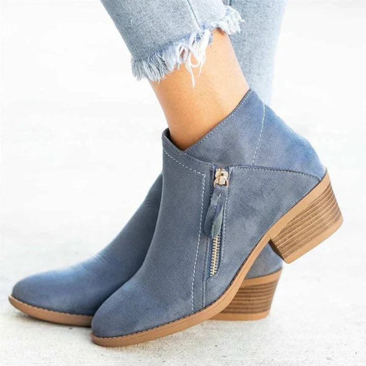 Juniper suede ankle boots in blue with side zip detail, side view