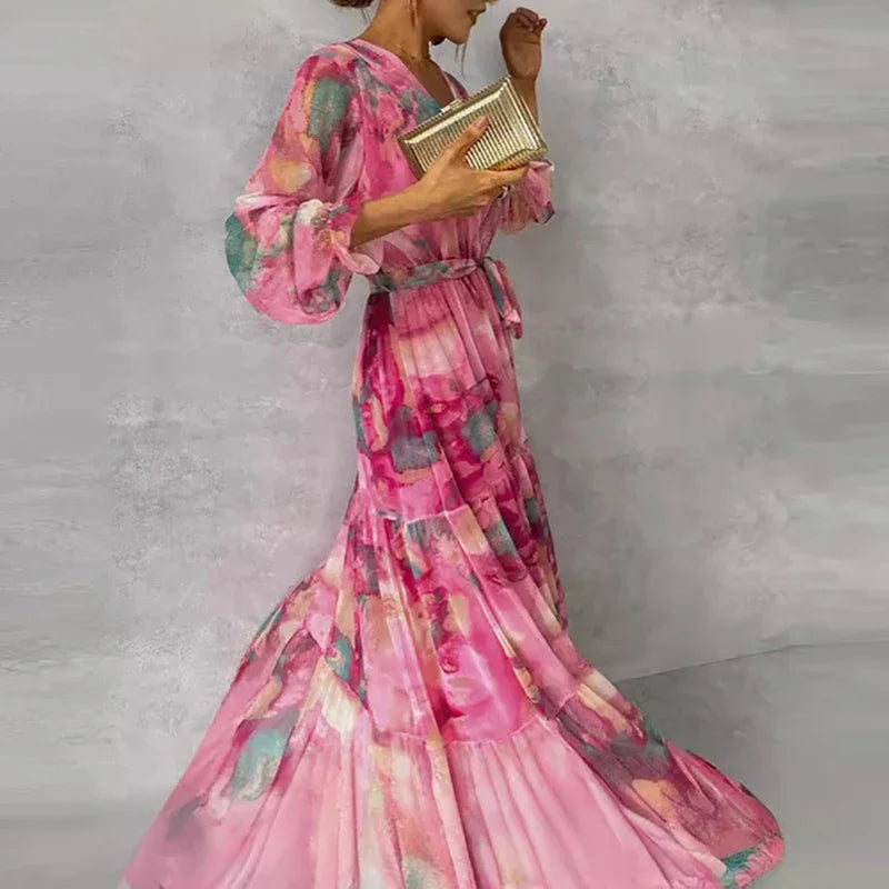 Katie floral wrap maxi dress side view showing flowing tiered skirt