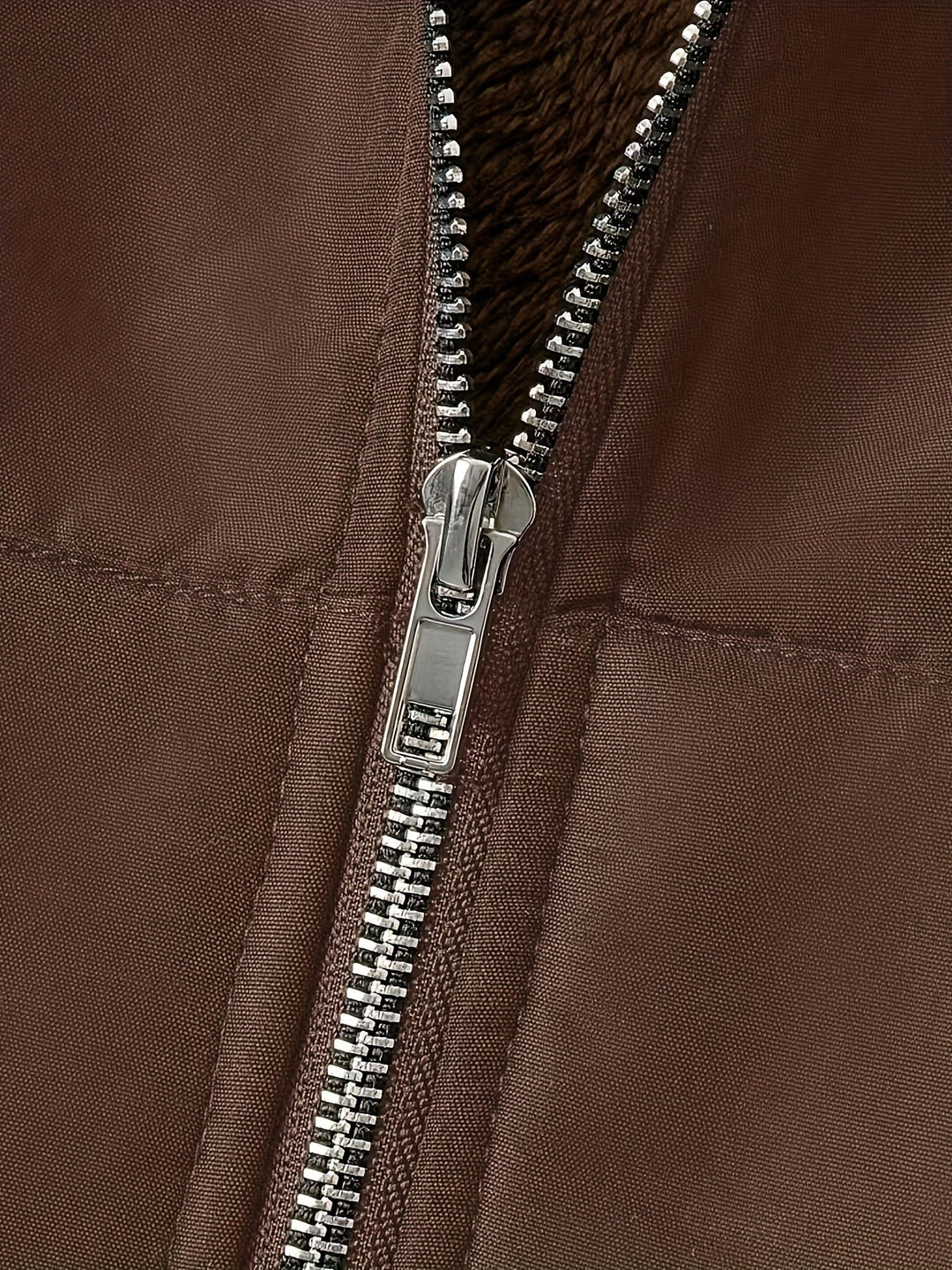 Close-up of Marcelline coat's deep front pocket with plush lining