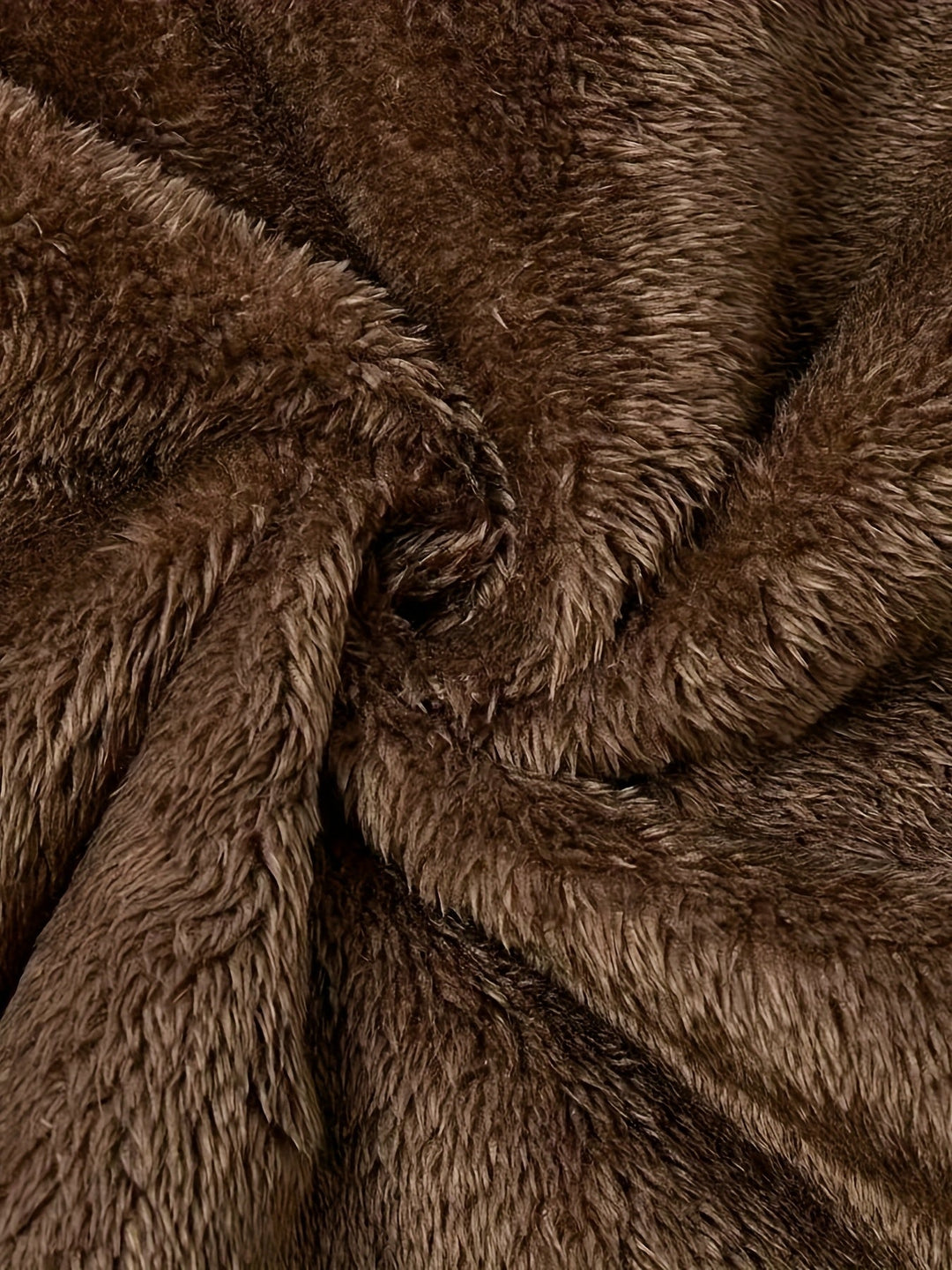 Close-up of Marcelline coat's deep front pocket with plush lining