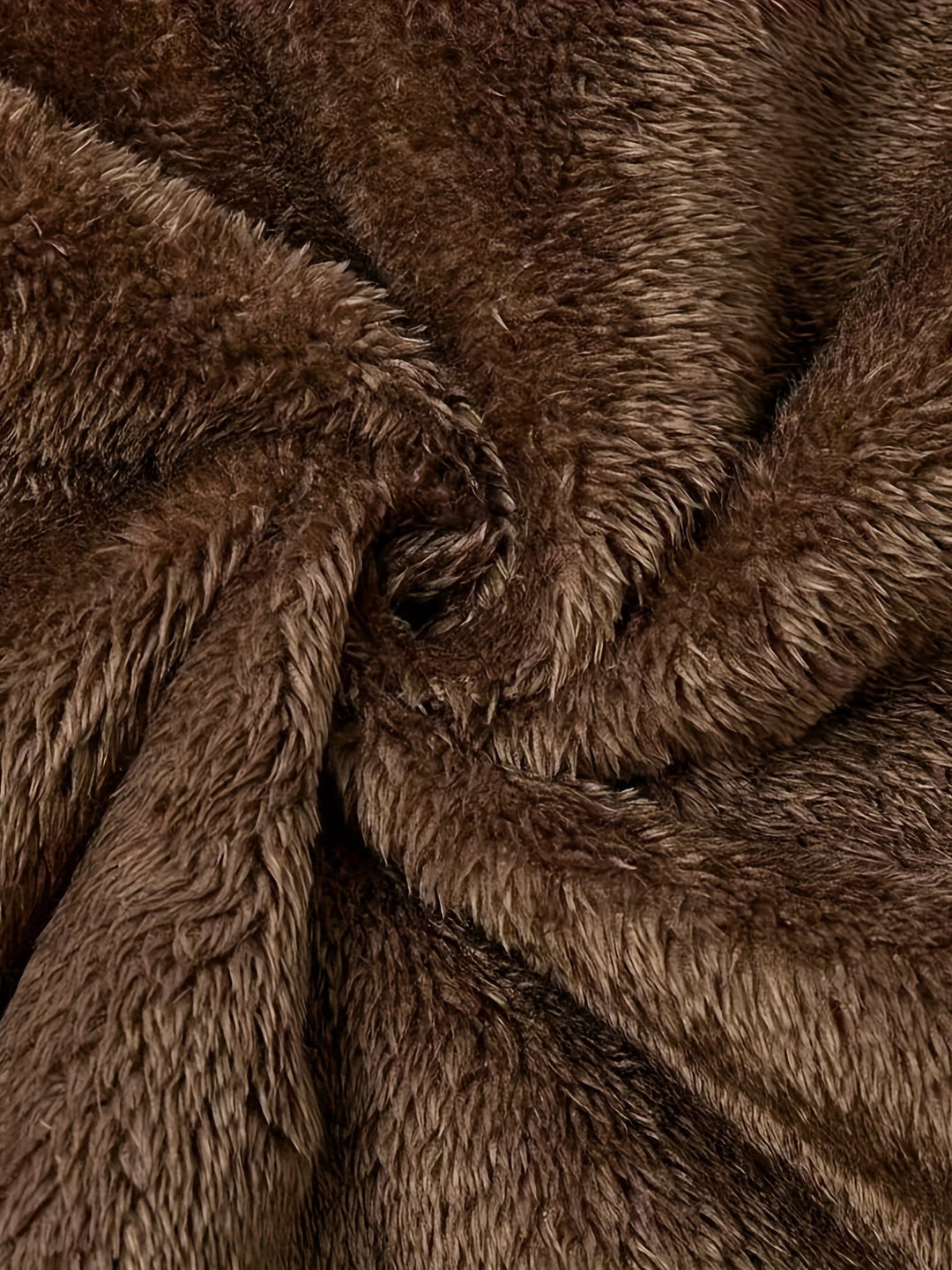Close-up of Marcelline coat's deep front pocket with plush lining