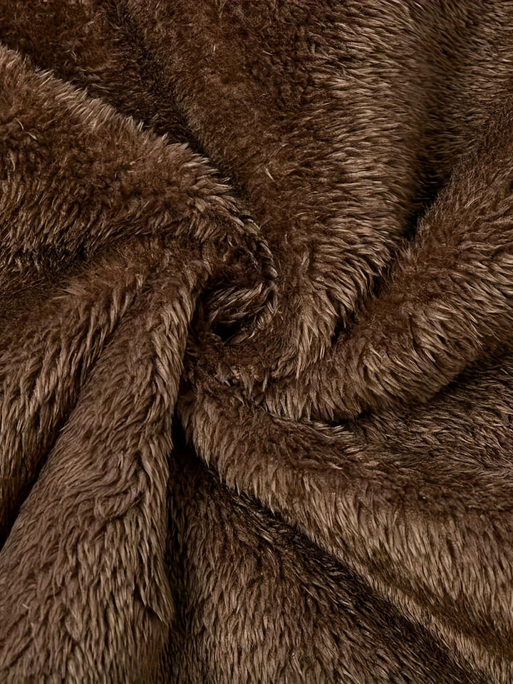 Close-up of Marcelline coat's deep front pocket with plush lining
