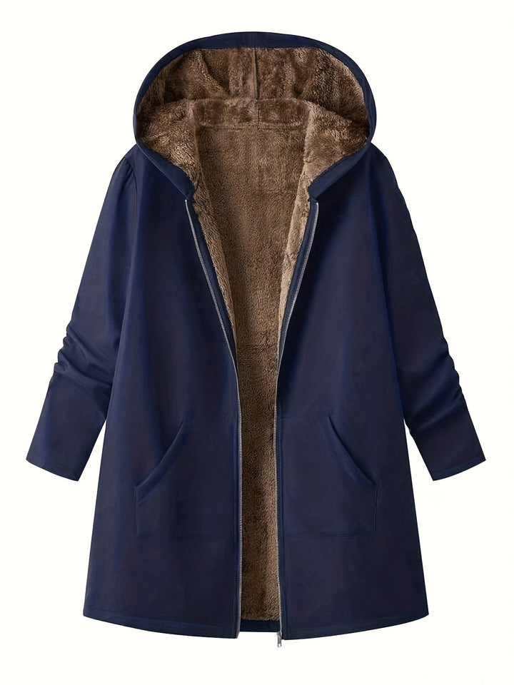 Close-up of Marcelline coat's deep front pocket with plush lining