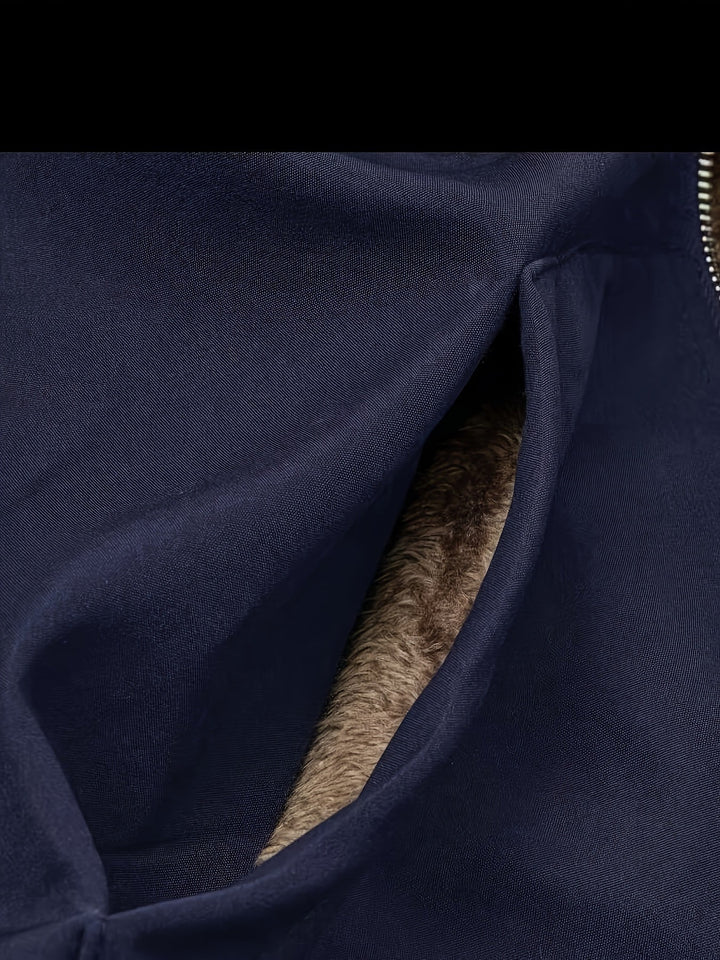 Close-up of Marcelline coat's deep front pocket with plush lining