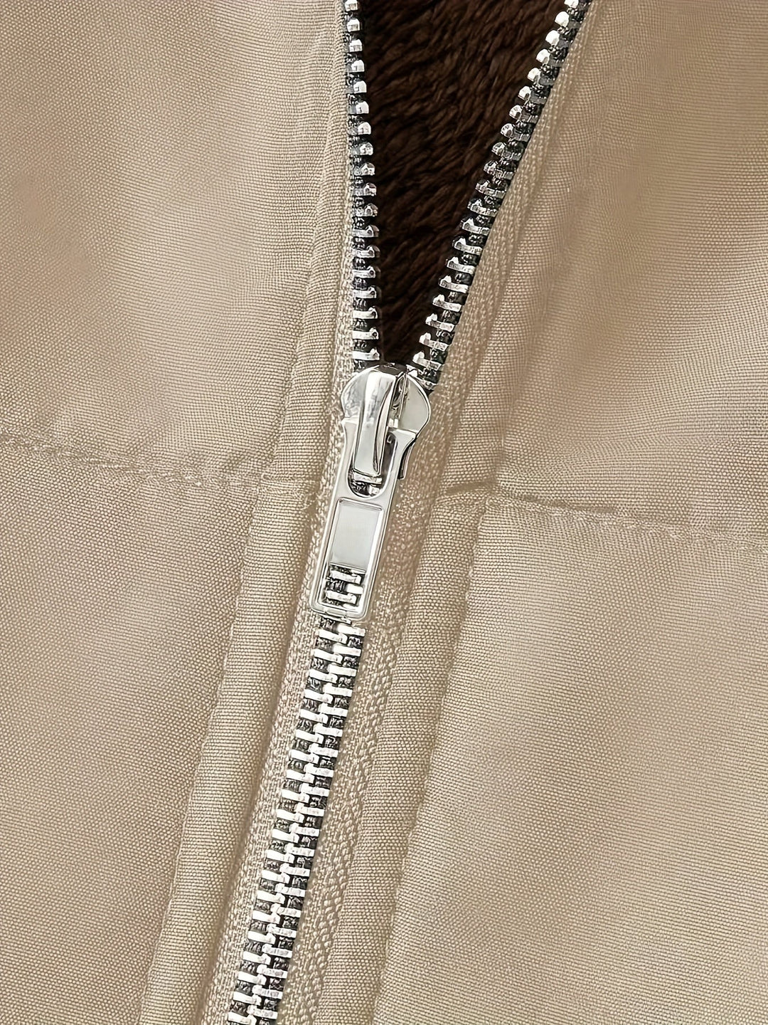 Close-up of Marcelline coat's deep front pocket with plush lining