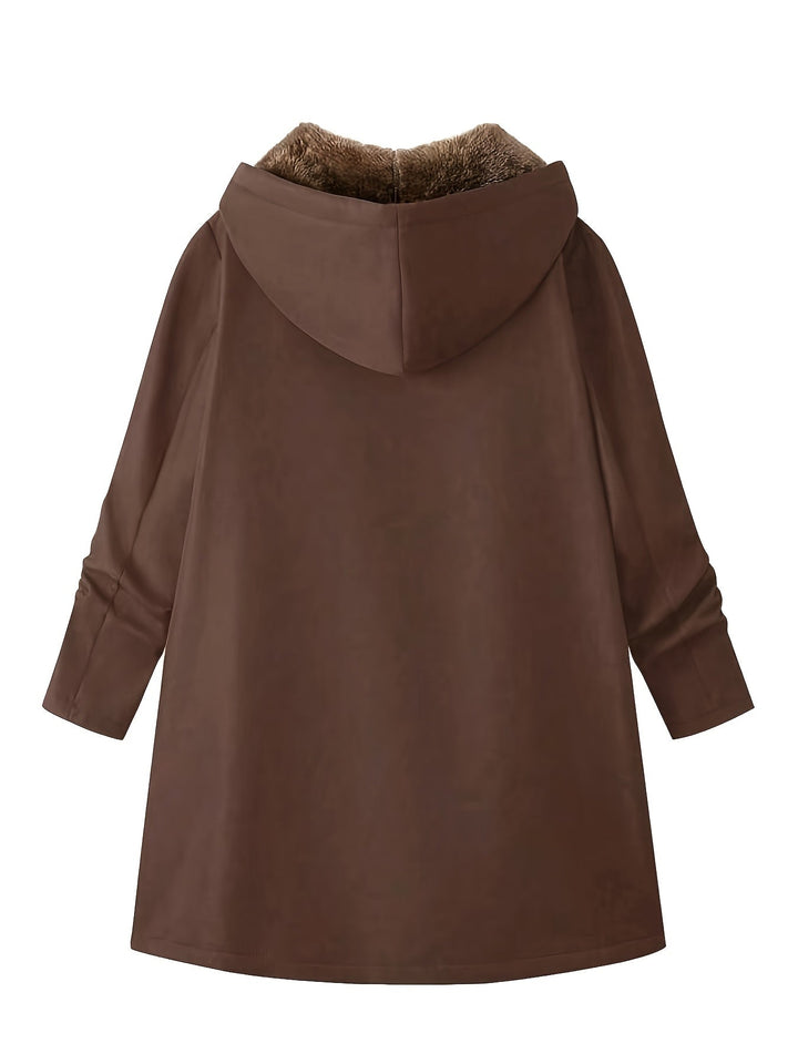 Close-up of Marcelline coat's deep front pocket with plush lining
