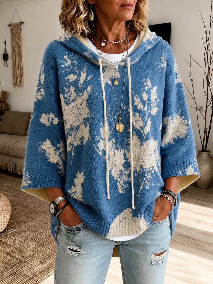 Marcelline hooded floral cape sweater, close-up of hood and sleeve