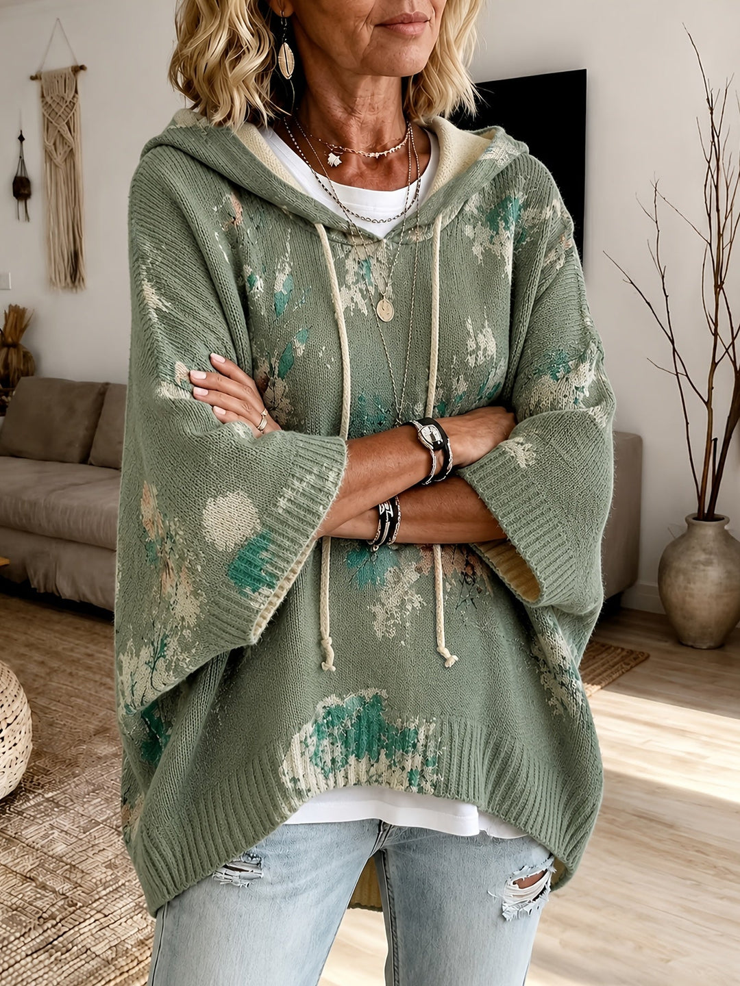 Marcelline hooded floral cape sweater, close-up of hood and sleeve