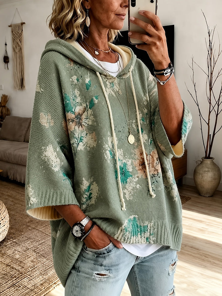 Marcelline hooded floral cape sweater, close-up of hood and sleeve
