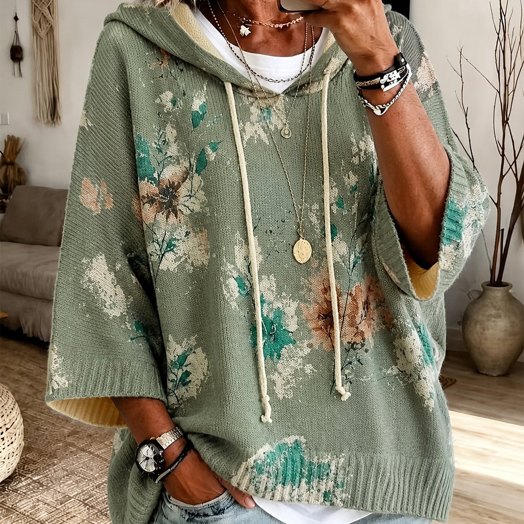 Marcelline hooded floral cape sweater, close-up of hood and sleeve