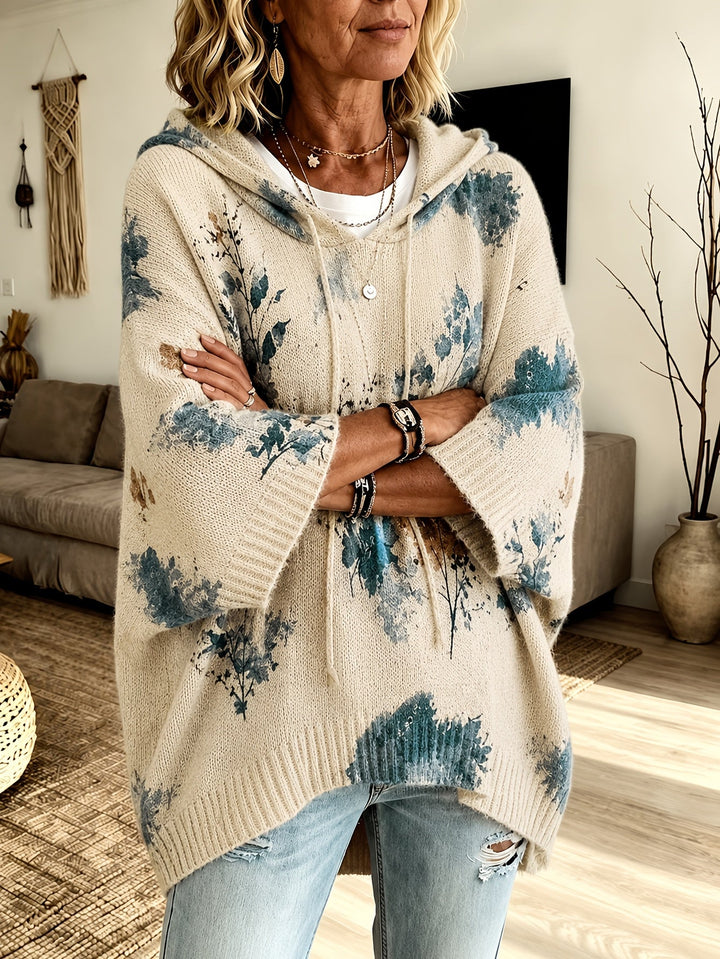 Marcelline hooded floral cape sweater, close-up of hood and sleeve