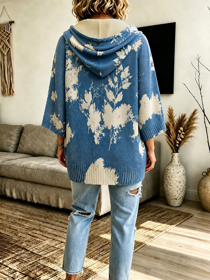 Marcelline hooded floral cape sweater, close-up of hood and sleeve