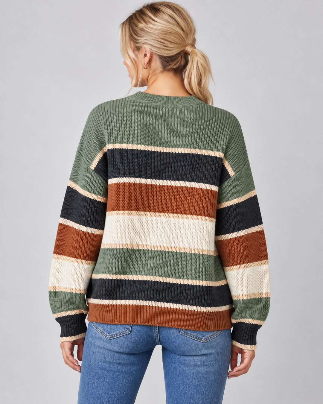 Margaux color block sweater in green colorway, side view on model