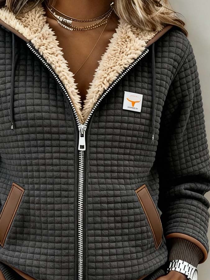 Margot quilted jacket close-up showing sherpa-lined hood and zipper detail