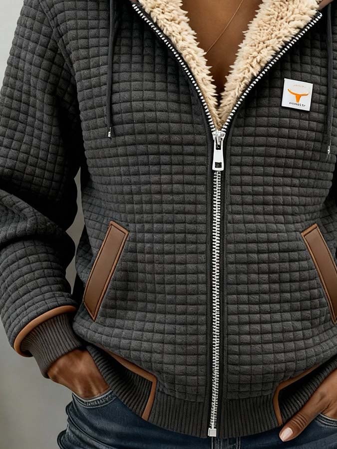 Margot quilted hooded jacket close-up with hands in pockets