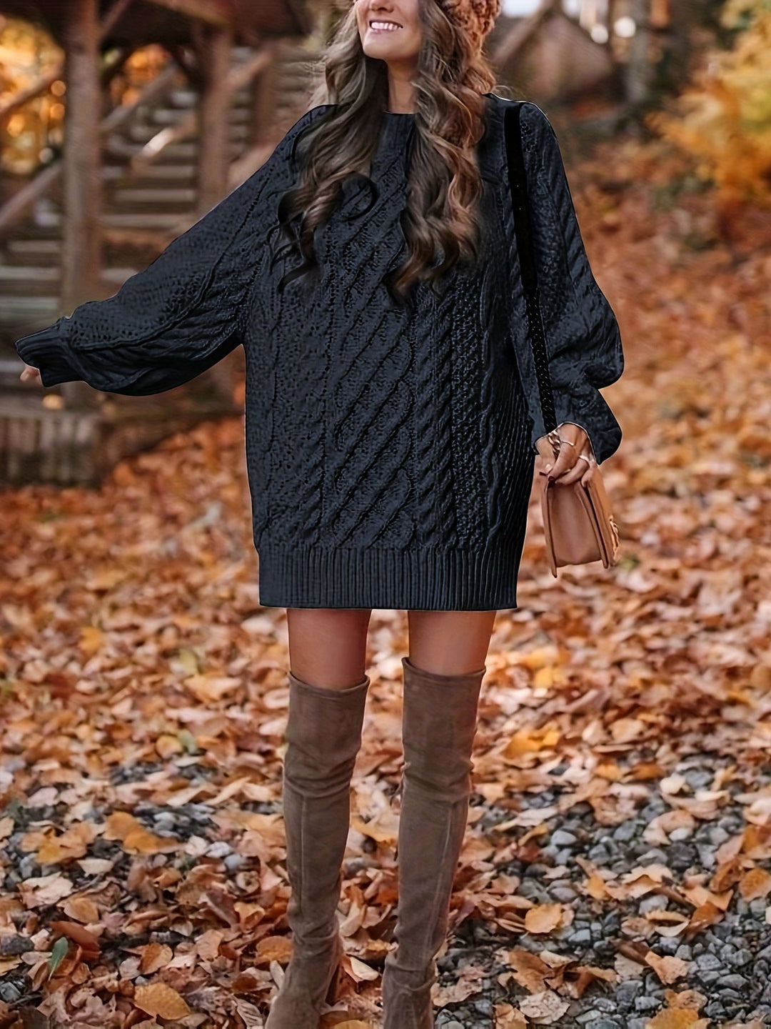 Marguerite cable-knit sweater dress styled with over-the-knee boots, full length