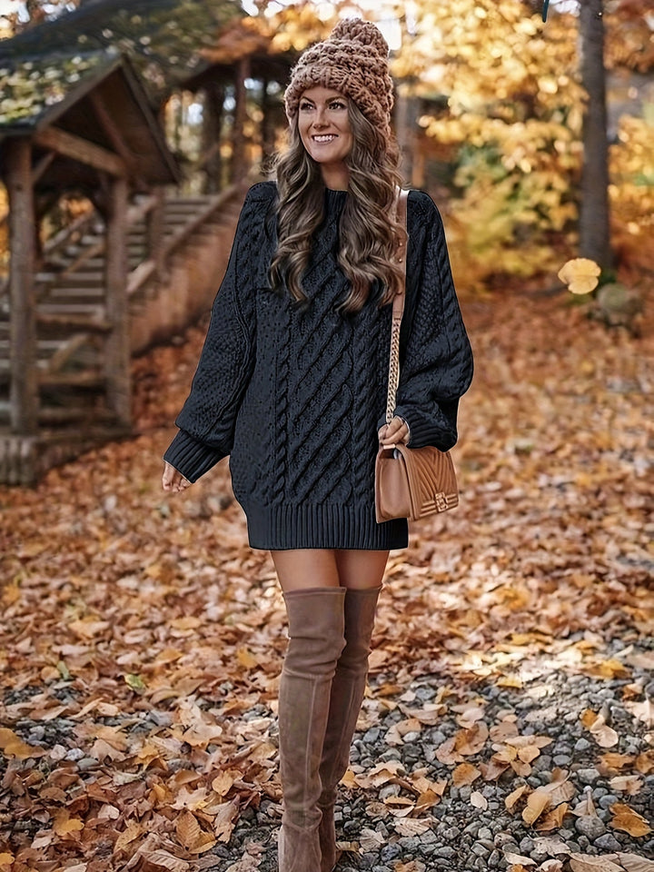 Marguerite sweater dress with pom-pom beanie and knee-high boots in autumn setting