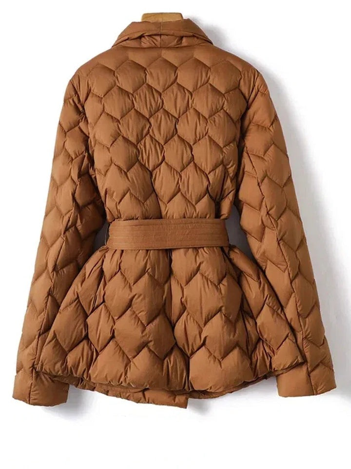 Marguerite quilted belted puffer jacket in caramel, back view showing tie belt detail