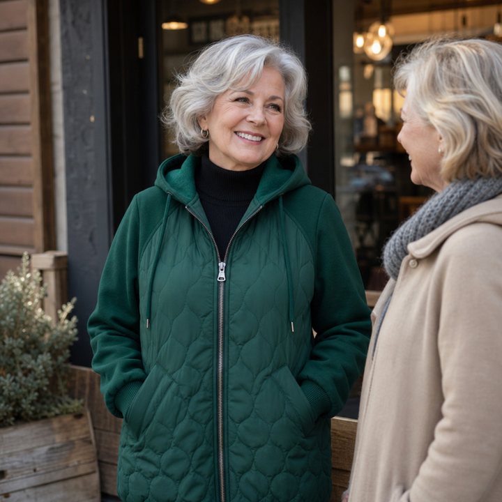 Marguerite quilted hooded puffer jacket, seated outdoor cafe view