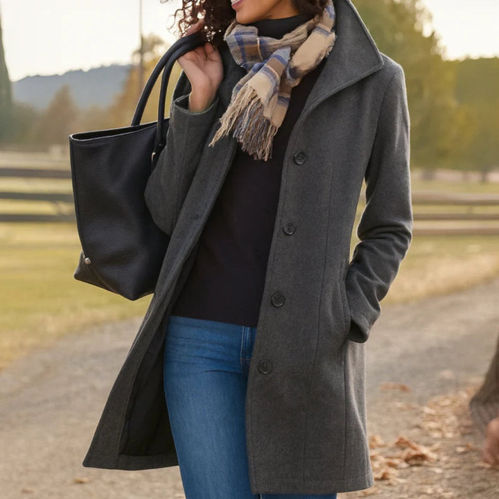 Marielle classic single-breasted mid-length coat in gray, front view styled with jeans