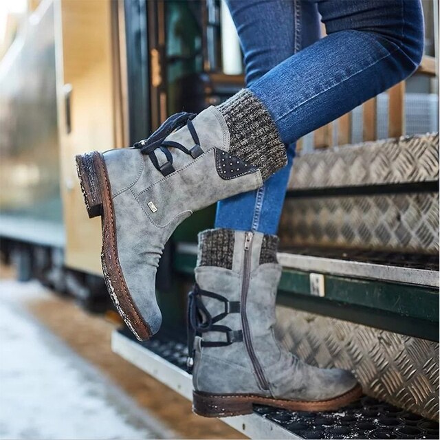 Marielle grey knit cuff mid-calf boots shown in pair on wooden steps