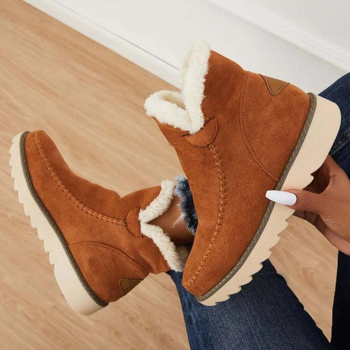 Marigold platform boots in beige, side view on model