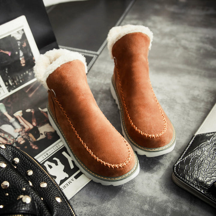 Marigold platform boots in beige, front view on model