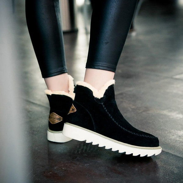 Marisol fur-trim ankle boots in black, walking view
