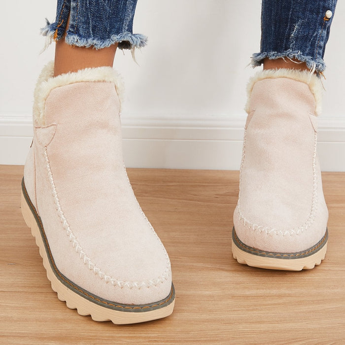 Marisol fur-trim ankle boots in light pink, front view on model