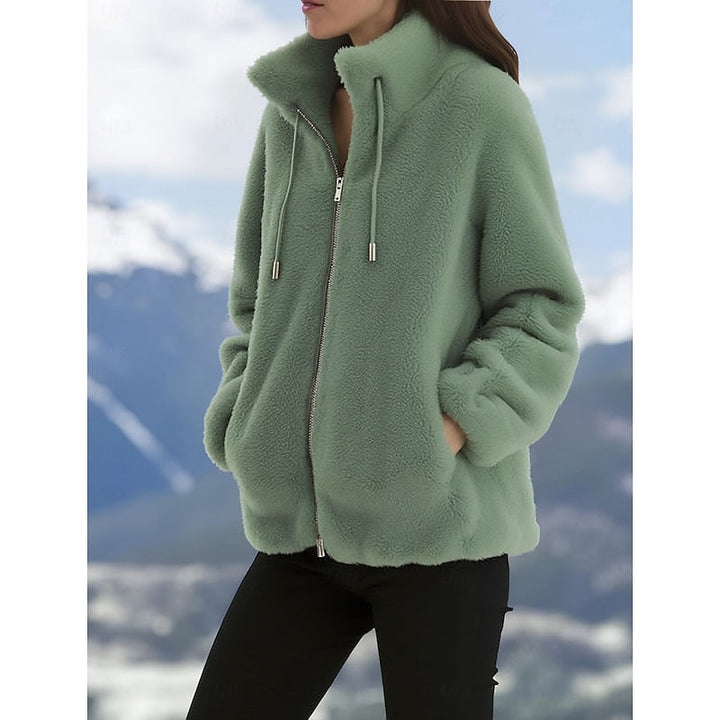 Marisol high collar fleece vest in green, front view