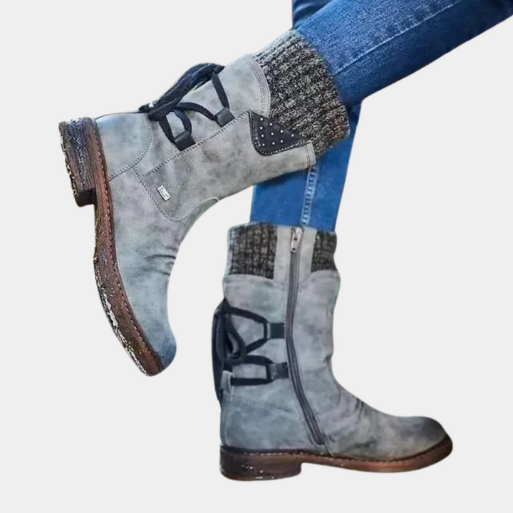 Marisol lace-up mid-calf winter boots with knit cuff, side view on model